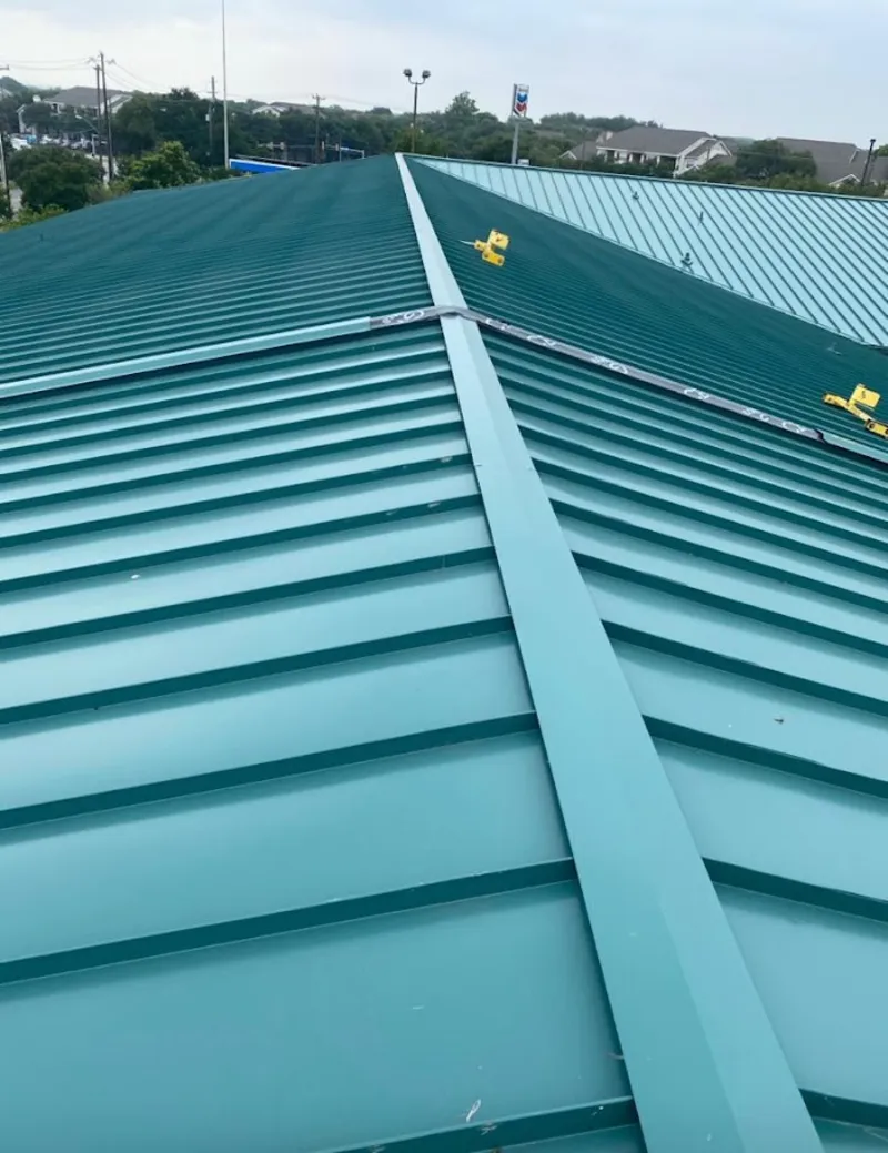 Green commercial metal roof ridge and valley for Metal Roof Repair in Picayune